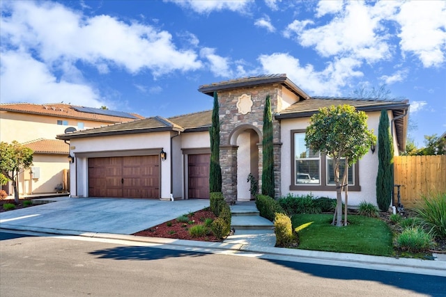 view of front of home featuring a garage