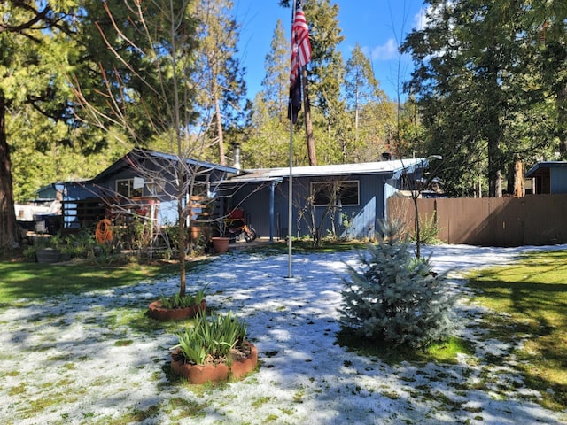 back of property featuring fence