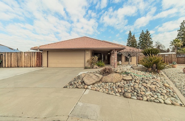 view of front of property with a garage