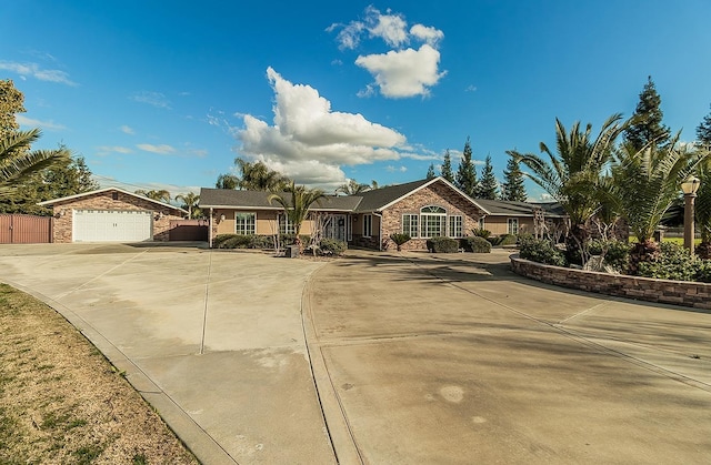 single story home featuring a garage