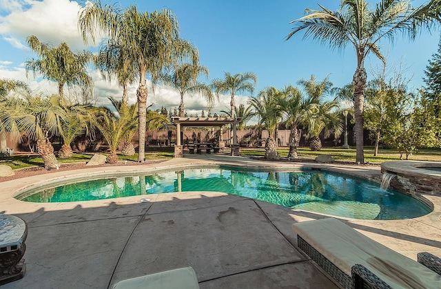 view of swimming pool with a patio and a pergola