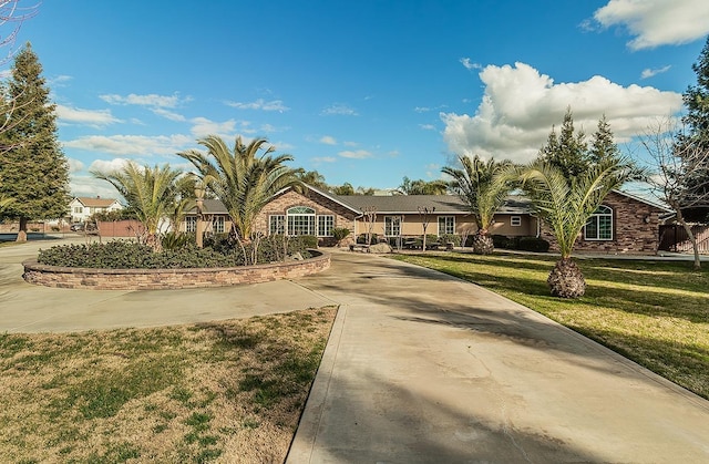 view of front of property with a front lawn