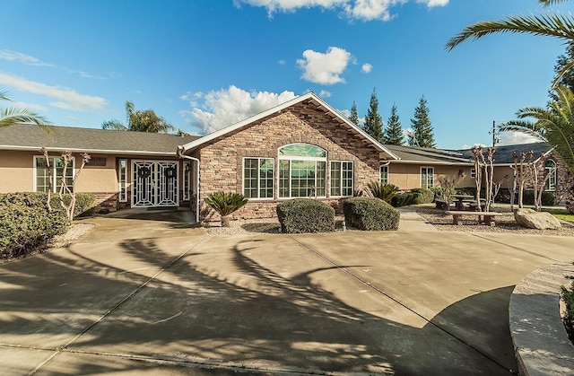 rear view of property with french doors