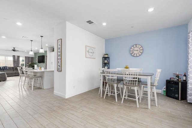 dining space with ceiling fan