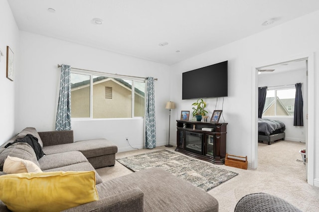 living room featuring light colored carpet