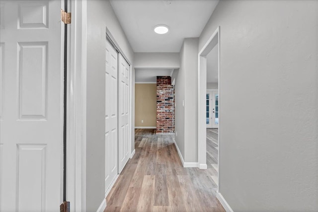 hallway featuring light hardwood / wood-style floors