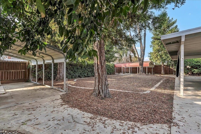 view of yard featuring a carport