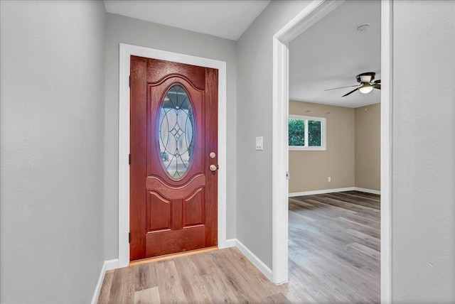 entrance foyer featuring ceiling fan and light hardwood / wood-style floors