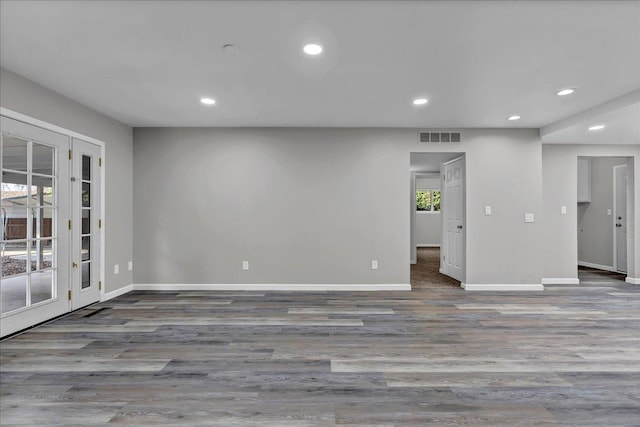 empty room with wood-type flooring