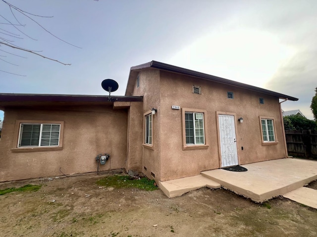 back of house featuring a patio