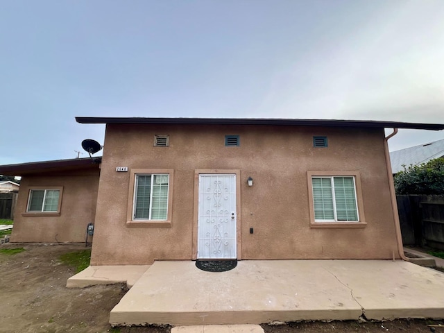 rear view of house with a patio area