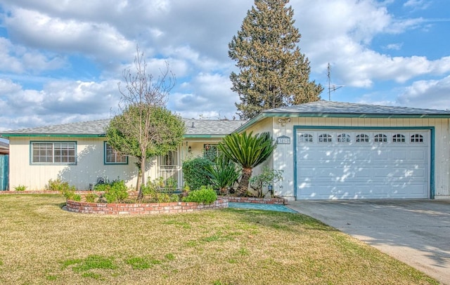 single story home featuring a garage and a front lawn