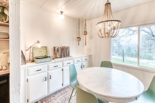 dining area with a chandelier