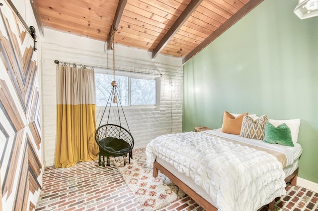 bedroom with baseboards, lofted ceiling with beams, wooden ceiling, and brick floor