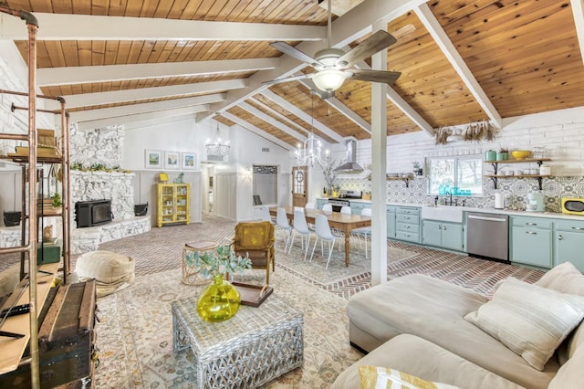 living area with wooden ceiling, vaulted ceiling with beams, and ceiling fan with notable chandelier