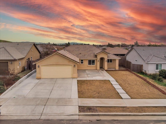 single story home with a garage