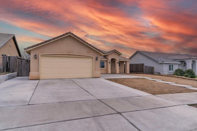 single story home featuring a garage