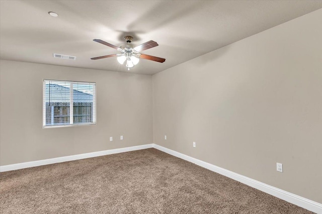 unfurnished room featuring carpet floors and ceiling fan