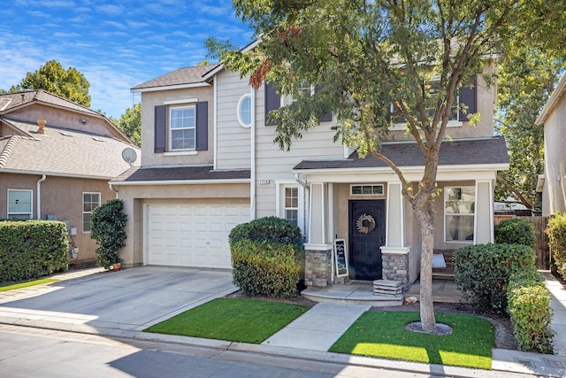 view of front of property featuring a garage