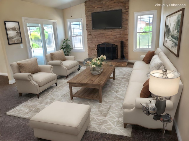 1855 Dennis Ave, Clovis, CA 93611 - living room featuring baseboards, a wealth of natural light, and a fireplace