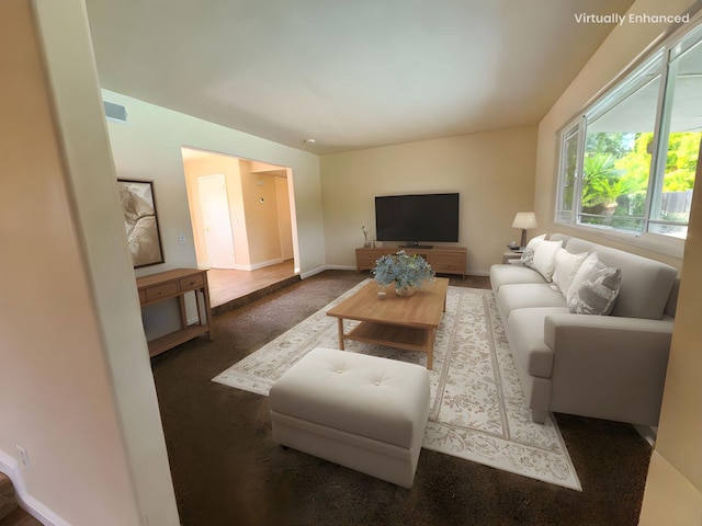1855 Dennis Ave, Clovis, CA 93611 - living room with baseboards and visible vents