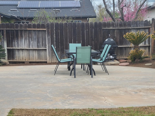 1855 Dennis Ave, Clovis, CA 93611 - view of patio featuring outdoor dining space and fence