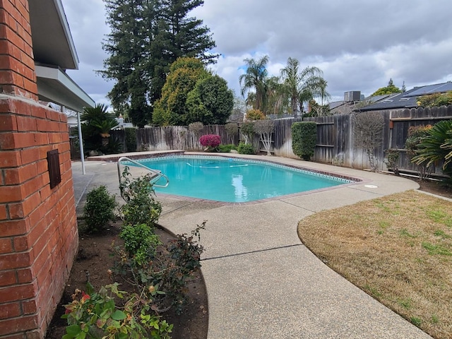 1855 Dennis Ave, Clovis, CA 93611 - view of pool with a fenced in pool, a patio area, a fenced backyard, and cooling unit