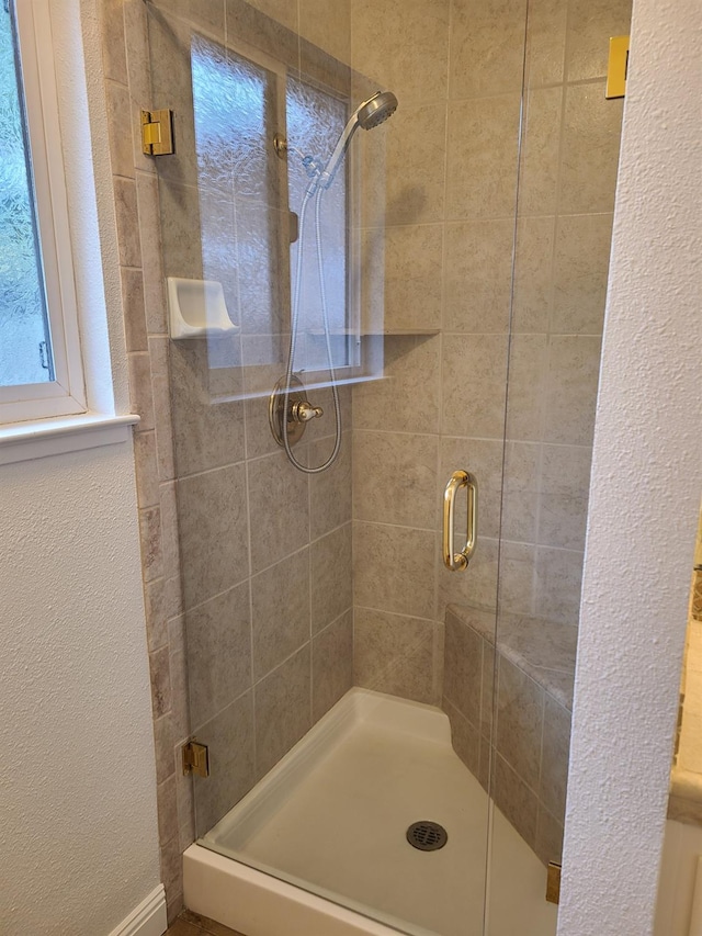 1855 Dennis Ave, Clovis, CA 93611 - full bath featuring a shower stall and a textured wall