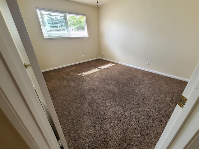 1855 Dennis Ave, Clovis, CA 93611 - carpeted spare room with baseboards