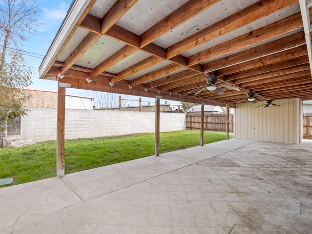 view of patio featuring ceiling fan