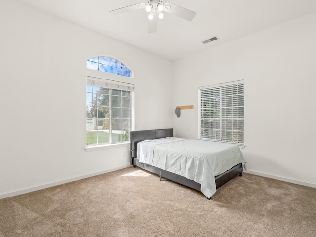 6702 N Langley Ave, Clovis, CA 93619 - bedroom featuring visible vents, baseboards, multiple windows, and carpet flooring