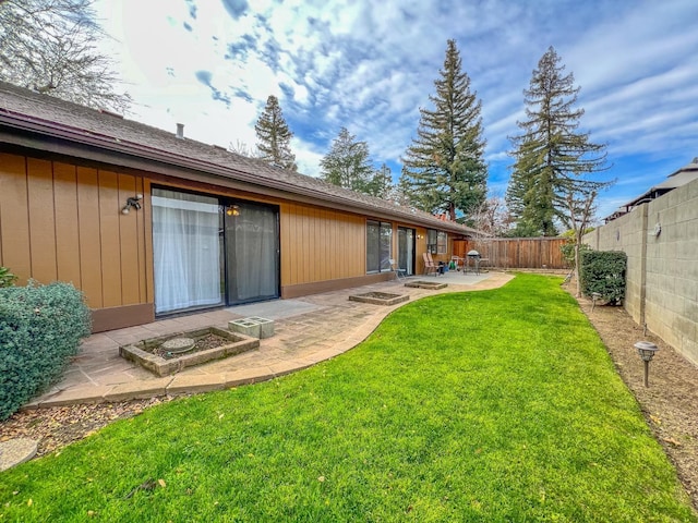 view of yard with a patio