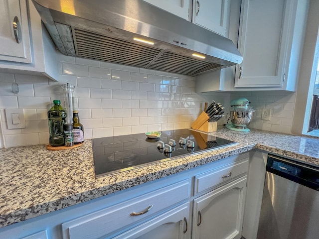 kitchen with white cabinets, stainless steel dishwasher, backsplash, and black electric cooktop