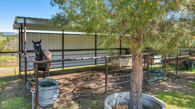 view of yard with an outdoor structure and an exterior structure