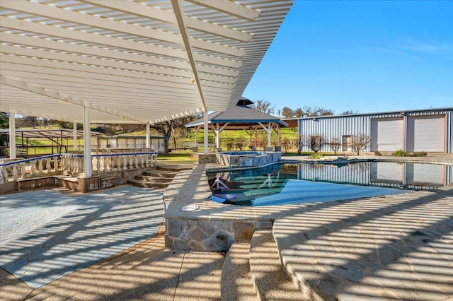 view of pool featuring a gazebo, a patio area, a pergola, and a swimming pool