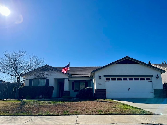 single story home featuring a garage