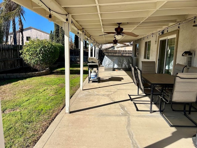 view of patio / terrace with ceiling fan and area for grilling