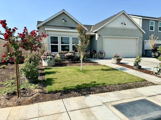 view of front of home featuring a front yard, fence, an attached garage, stucco siding, and concrete driveway