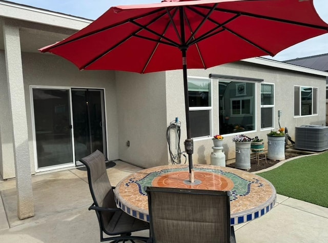 view of patio / terrace featuring cooling unit