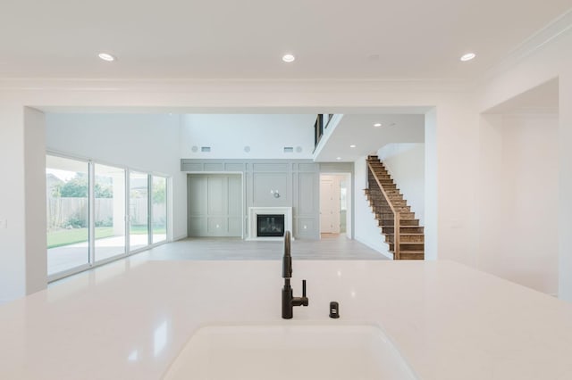 kitchen with sink and crown molding