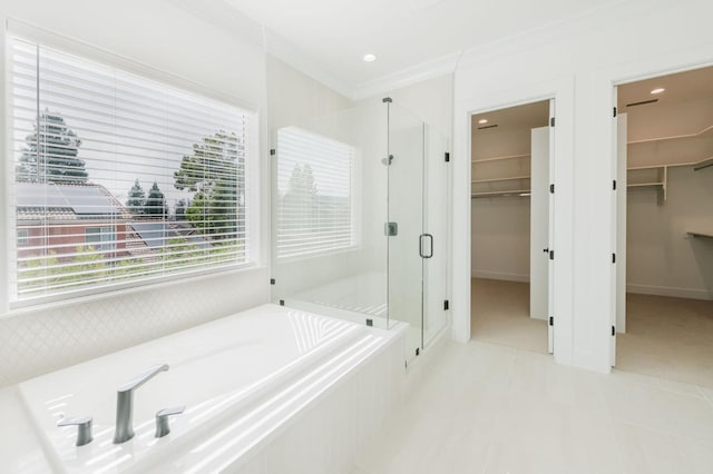 bathroom with crown molding, tile patterned floors, and independent shower and bath