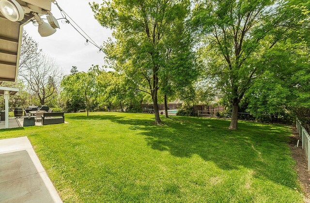 16526 Paula Rd, Madera, CA 93636 - view of yard with a fenced backyard and a patio