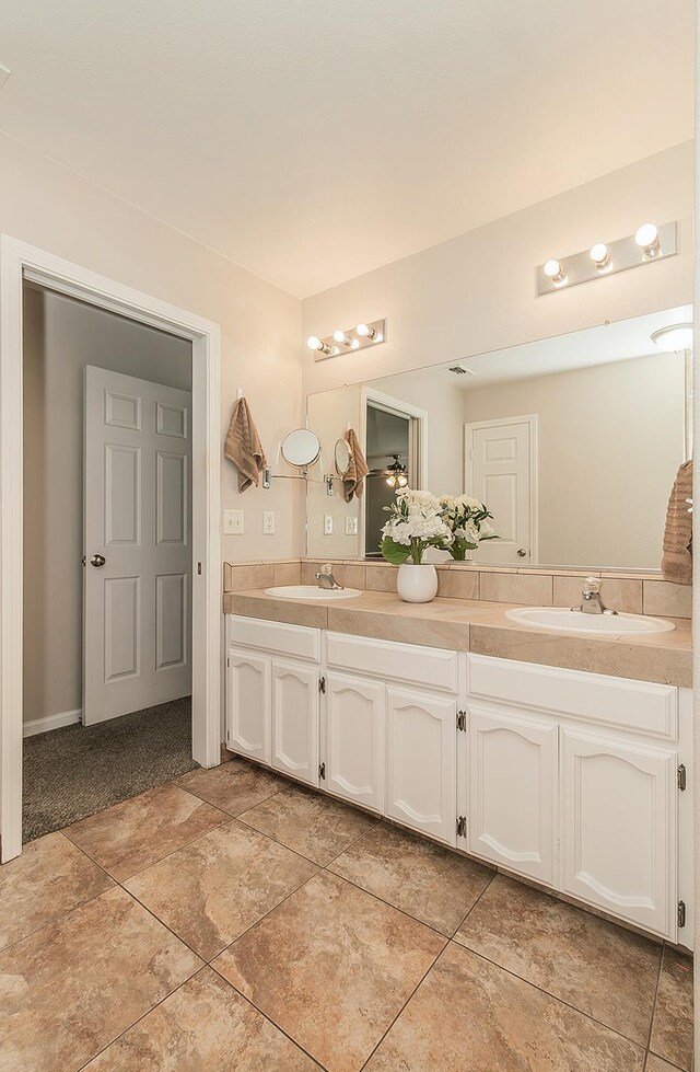 16526 Paula Rd, Madera, CA 93636 - bathroom featuring double vanity and a sink