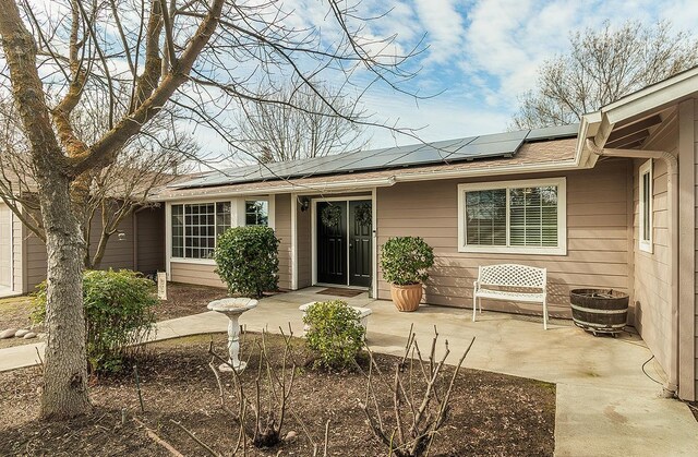 16526 Paula Rd, Madera, CA 93636 - exterior space with roof with shingles and solar panels