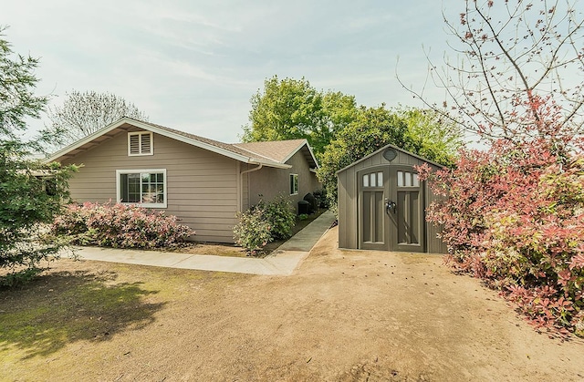 16526 Paula Rd, Madera, CA 93636 - exterior space featuring a storage shed and an outdoor structure