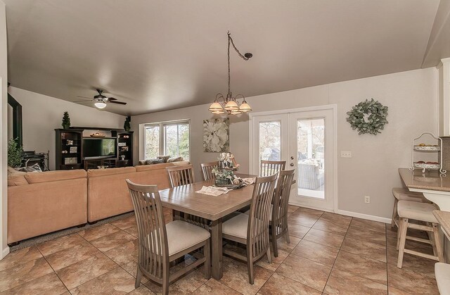 16526 Paula Rd, Madera, CA 93636 - dining area with french doors, baseboards, light tile patterned floors, and ceiling fan with notable chandelier
