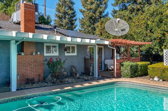 view of pool with a pergola