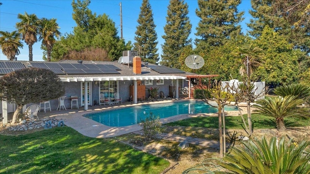 8302 S Leonard, Fowler, CA 93625 - outdoor pool featuring a patio area and a yard