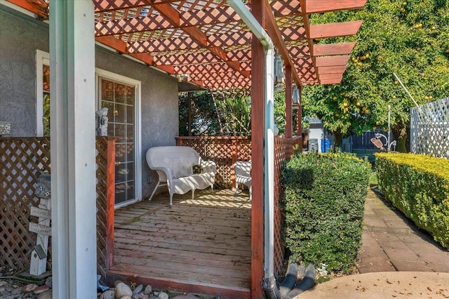 wooden terrace with a pergola