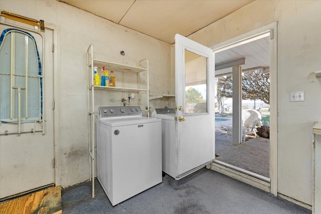 clothes washing area with independent washer and dryer